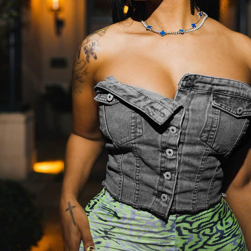 Top abbottonato in denim termoretraibile