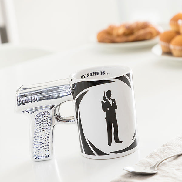 Tazza con pistola dell'agente segreto