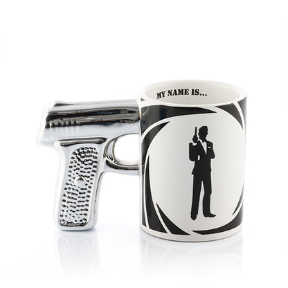 Tazza con pistola dell'agente segreto